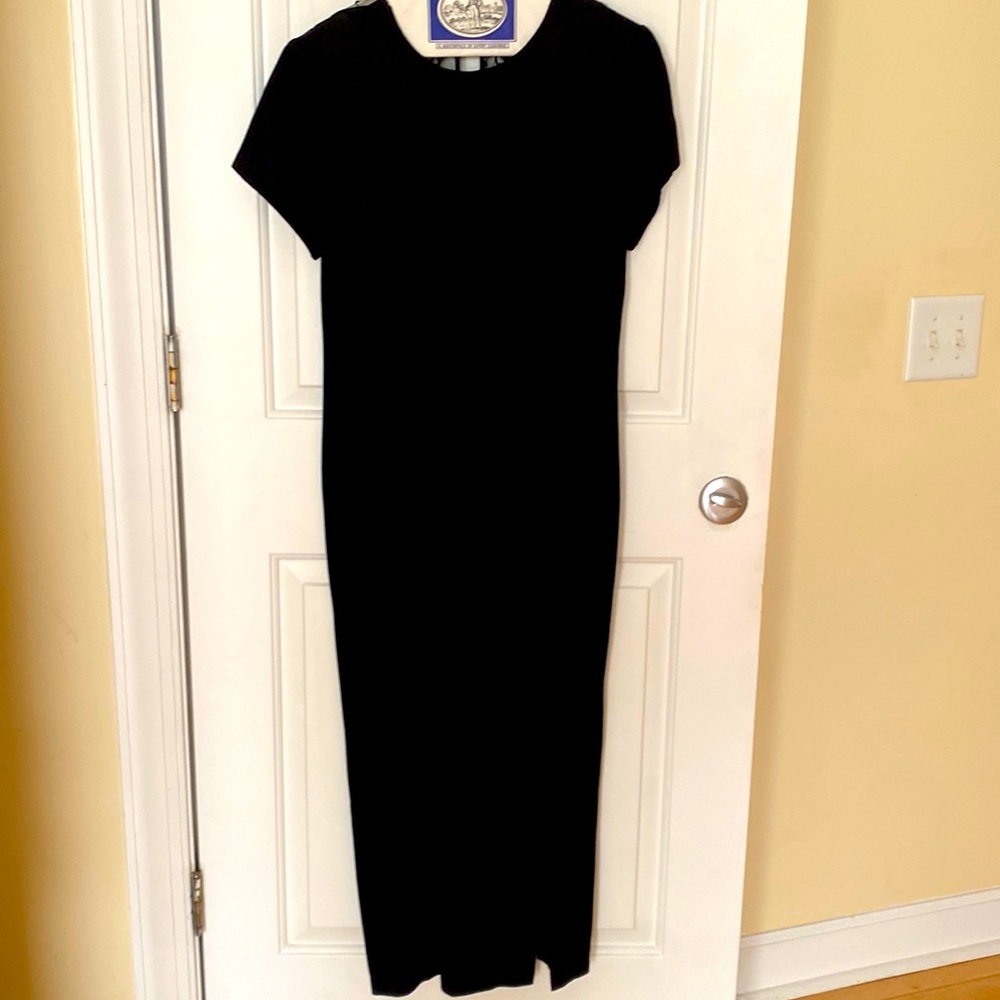 Long black dress with button blackout.  Backout cover with netting.